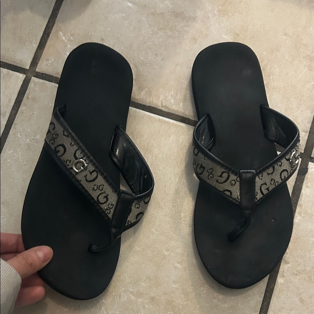 Guess Black Footbed Flip Flops with Beige Monogram Straps